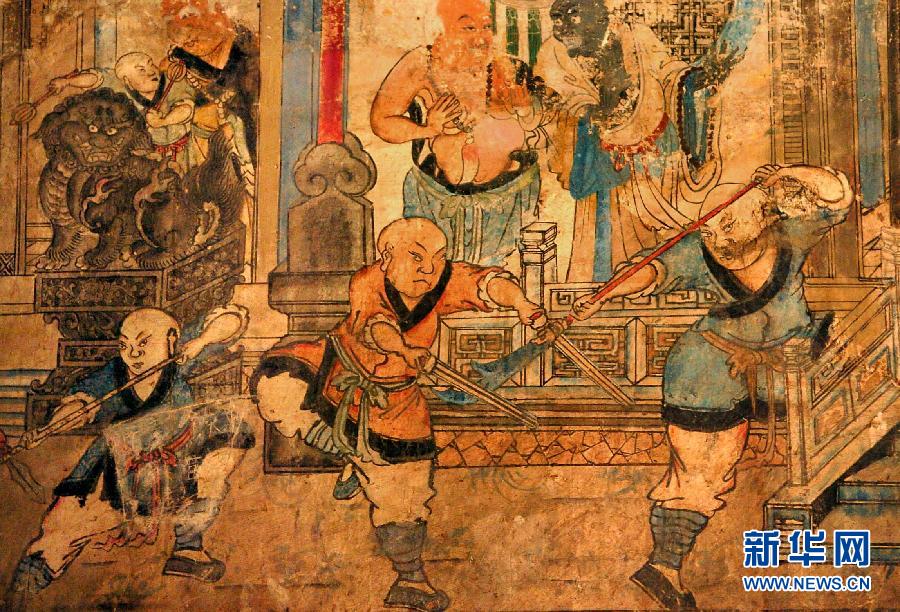 少林寺白衣殿內(nèi)的墻上表現(xiàn)少林武僧習(xí)武練拳的壁畫(局部,2005年9月15日攝)。