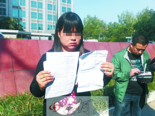 拿著兩份檢查結(jié)果完全相反的報(bào)告單,梁女士很郁悶。