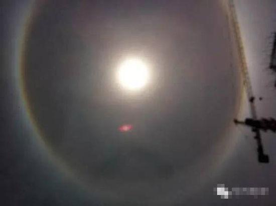 上?，F(xiàn)UFO 專家稱光圈是日暈亮點或是飛行器(圖)