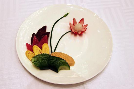 迎賓冷盤“洋花蘿卜”。 花惠生 供圖