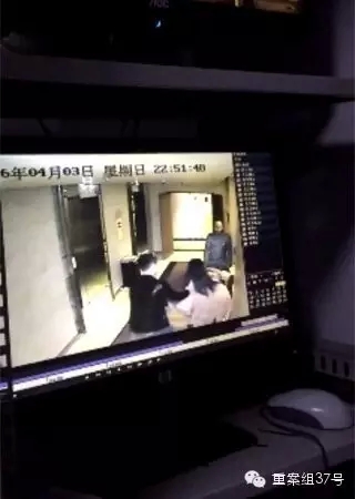 一女子在酒店被陌生男子拖拽。    視頻截圖