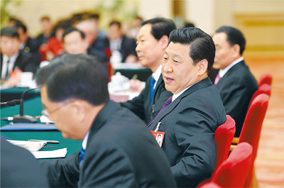 2014年3月9日，習(xí)近平參加十二屆全國人大二次會議安徽代表團的審議。